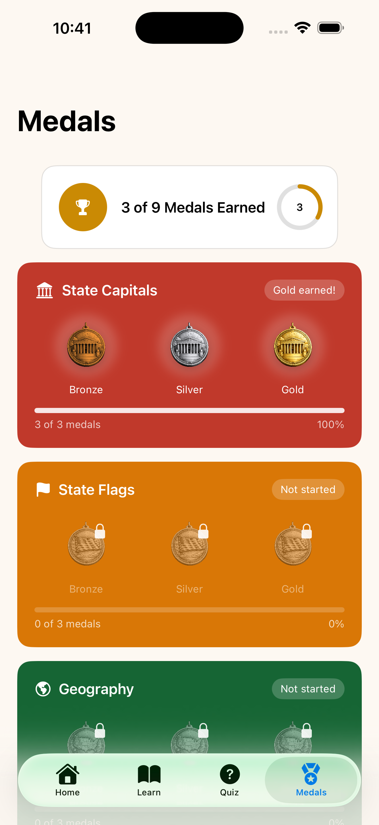 Medal achievements showing Bronze, Silver, and Gold progress